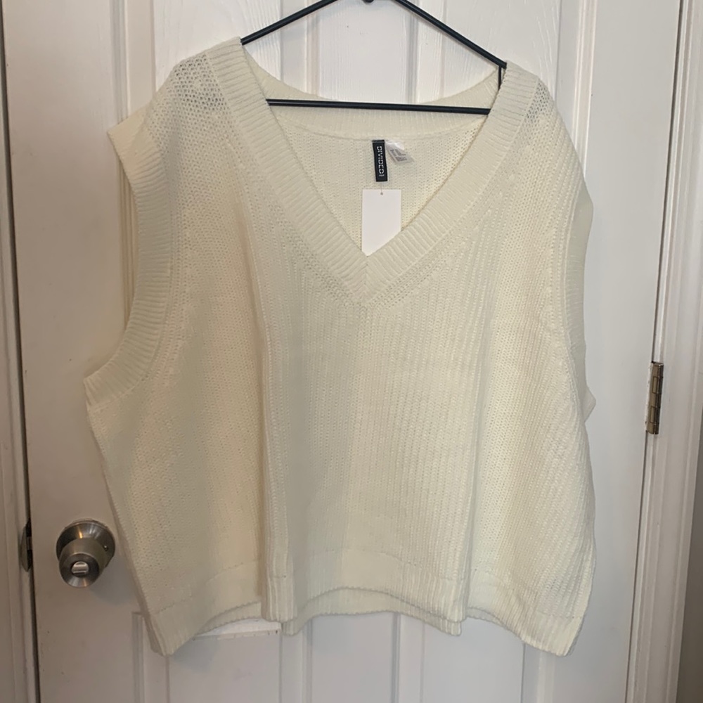 White sweater vest
